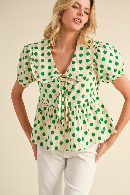green peplum shirt