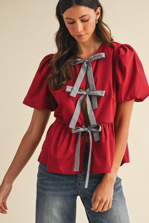 Game Day Bow Detail Peplum Top Crimson