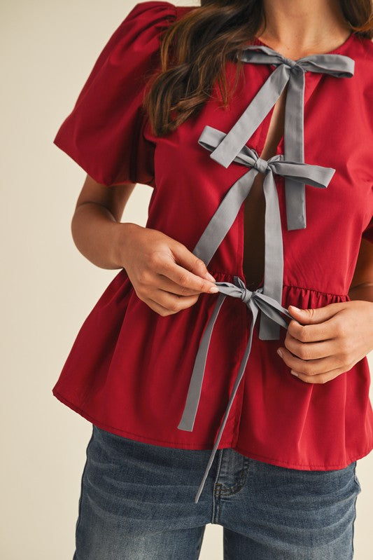 Game Day Bow Detail Peplum Top Crimson